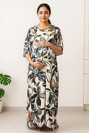 Woman wearing a rayon maternity maxi dress with both side zippers for feeding